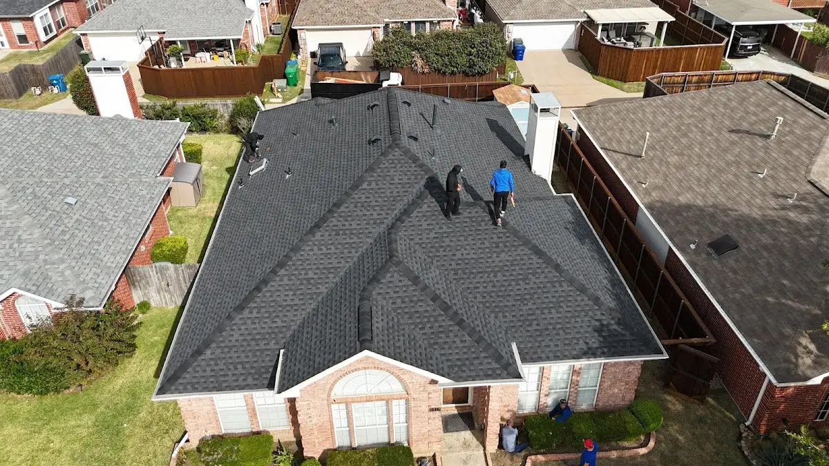 Slate & Tile Roof Repair work in progress on a Mandan property